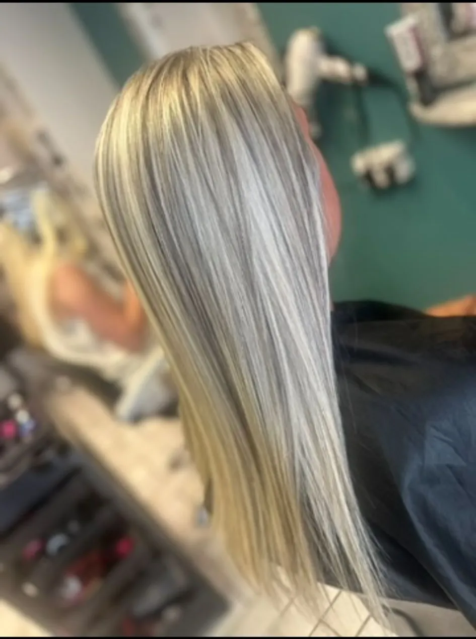 Icy blonde foil highlights on long straight hair